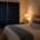 Bedroom with blackout curtains and soft evening lighting for better sleep